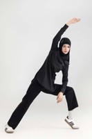 Tunique de sport pour femmes musulmanes, mode modeste, avec logo personnalisé OEM, ourlet incurvé, haut long, anti-remontée