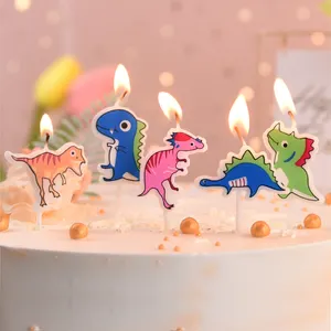 Vela de cumpleaños de dinosaurio.