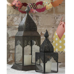 Ornamental Iron Lantern with Traditional Vintage Design and Heat Resistant Exterior Finish - Product Image 1