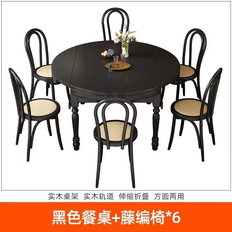 Table à manger noire et chaises en rotin * 6