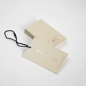 Etichetta di lusso con stampa personalizzata, etichetta altalena con logo in lamina d'oro stampato in lamina d'oro rosa che timbra lucido