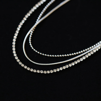 Collier ras de cou en acier inoxydable argenté tressé à trois couches et sans ternissure avec chaîne en forme de serpent et strass pour filles