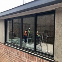 Ventana deslizante UPVC de apertura horizontal de estilo chino insonorizada de doble acristalamiento individual de alta calidad con persiana enrollable
