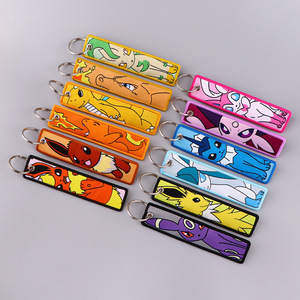 26 thiết kế mới Chất lượng cao Keyring Pika pokemonster thêu <span class=keywords><strong>tag</strong></span> Keychain cho ba lô trang trí - Product Image 4