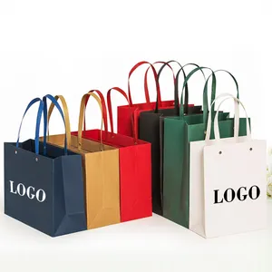 Luxury Custom Own Logo Printed Retail Clothing Packaging Paper Bag Shopping Packaging Paper Bag For Apparel