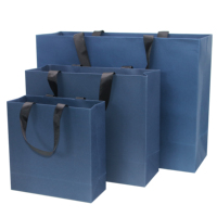 Sacs en papier personnalisés en gros pour le marché du commerce, avec impression esthétique ivoire et dorure rose, pour cadeaux et publicité, pour T-shirts, personnalisables en ligne