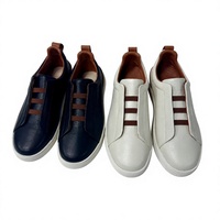 Chaussures plates en cuir véritable pour hommes, style business-casual ; l'usine accepte les commandes OEM ; matériaux et couleurs personnalisables.