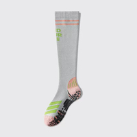 Chaussettes de sport à haute adhérence personnalisées pour femmes Pilates Course à pied Longues chaussettes de compression hautes jusqu'au genou Antidérapantes Chaussettes de sport pour la course à pied Cyclisme