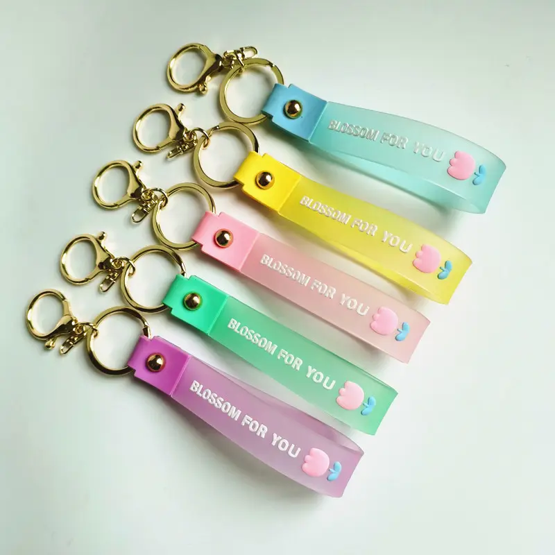 Lilangda flower into the oil bottle hand strap key chain three-piece set of color drop rubber leather rope keychain wristbands