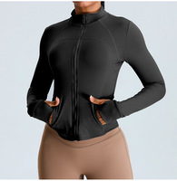 Veste de yoga en gros à fermeture éclair, manches longues, coupe ajustée, avec trou pour le pouce, col montant, pour la course et le sport