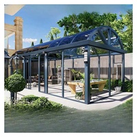 Véranda contemporaine de luxe en aluminium avec structure isolée et verre trempé rétractable pour jardin d'hiver