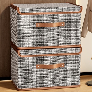 Boîte de rangement monobloc de style compact gris avec couvercle, en tissu, portable, pliable et empilable, pour couettes, vêtements et jouets - Product Image 1