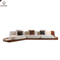 Foshan Sofa 3-4-Sitzer Hochwertig Italienisches Luxus-Echtleder Luxus-Büro- und Heimsofa Geschwungenes Luxussofa