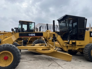 รถเกรดเดอร์ CAT 140G มือสอง เหมาะสำหรับโครงการต่างประเทศ เครื่องจักรเกรดดิน CAT 140G ระบบบังคับเลี้ยวแบบยืดหยุ่น ปรับมุมใบมีดได้ - Product Image 1
