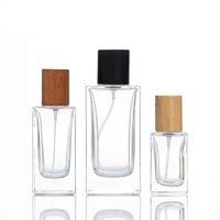 Vente chaude 30ml 50ml 100ml carré de luxe vide bouchon en bois bouteille de parfum en verre personnalisé 50ml de luxe