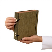 Boîte cadeau rigide de style livre personnalisée avec doublure en velours noir, emballage de luxe pour le thé et les cosmétiques