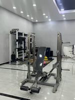 DINUO Rack de musculation gain de place, banc réglable multi-positions avec support de barre et presse à jambes pour l'entraînement de force