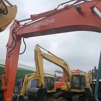 Excavatrice sur chenilles Hitachi EX200 d'occasion avec valve de commande, offrant des performances exceptionnelles, excellent rapport qualité-prix, en bon état