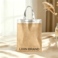 Sacs cabas de luxe élégants en papier kraft laminé PE avec bordure argentée, logo personnalisé imprimé pour la vente de bijoux et les cadeaux