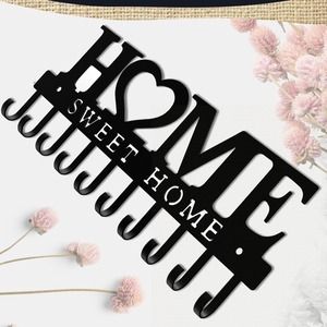 Home Sweet Home - Perchero decorativo de metal con 10 ganchos para almacenamiento en la entrada, color negro - Product Image 1