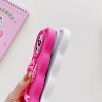 Couverture de téléphone ondulée avec nœud scintillant doux amour coeur liquide décoration 3D coques de téléphone personnalisées pour iPhone 13 15 16 Pro Max couvre