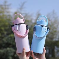 Bouteille isotherme portable en acier inoxydable 18/8 de 1 L, performance thermique 12-24 h, design avec poignée, camping, extérieur, affaires