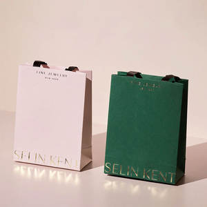 2025 Shopping Emballage Papier Kraft <span class=keywords><strong>Boutique</strong></span> Bowknot Papier Premium Sacs Cadeaux Fantaisie avec Bowknot - Product Image 1