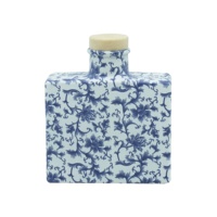 Bouteille en verre diffuseur de roseaux avec bouchon HAODEXIN 100ml bouteilles de diffuseur de roseaux décoratifs 3.4oz céramique de porcelaine de transfert d'eau