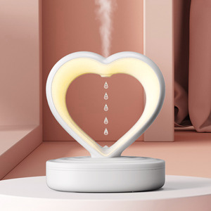 Diffuseur de parfum romantique rose en forme de cœur, à goutte d'eau anti-gravité, alimenté par USB, portable, en plastique, contrôlé par application, avec fonction de minuterie - Product Image 1