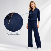 Ensemble décontracté deux pièces pour femme, bleu marine, broderie florale, coupe ample, avec fermeture éclair, manches longues, en coton aéré, pantalon large