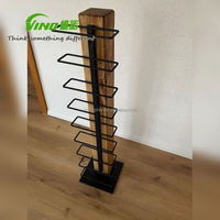 Porte-vin minimaliste vertical en bois et métal, sur pied, pour le rangement du vin
