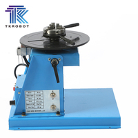 Positionneur de soudage à table tournante TKweld 220V avec trous de temporisation, roulements durables, mandrin, capacité de charge de 600 kg, diamètre de table de 650 mm