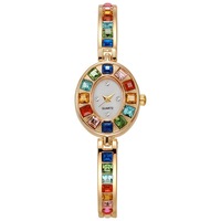 Montre-bracelet compacte de luxe pour femme, style américain NYY, avec cadran ovale décoratif en verre orné de diamants colorés, en alliage, pour étudiantes