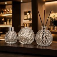 Bouteille diffuseur en verre rond de haute qualité 100 ml 250 ml avec bouchon à vis pour diffuseur d'huiles essentielles