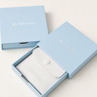 Boîte à bijoux en papier bleu clair personnalisée OEM avec ouverture à tiroir et pochette à bouton pour les détaillants, les grossistes et les boutiques de bijoux