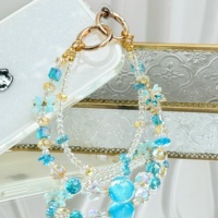 Cordon de téléphone esthétique bleu œil de chat avec perles, breloque de téléphone double brin en forme de fleur, joli ornement quotidien pour sac