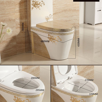 WC monobloc en céramique de luxe OEM, motif floral doré, moderne, avec auto-désodorisation, chasse d'eau à siphon et abattant à fermeture douce, pour villas et hôtels