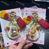 Chaîne de téléphone Crybaby Fashion, porte-clés DIY, mini-lanière mignonne de dessin animé - Plusieurs couleurs, vente en gros