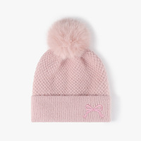 Bonnet en tricot épais doublé polaire avec broderie nœud et pompon pour femme, en fausse fourrure douce, idéal pour l'extérieur - Vente en gros