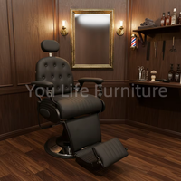 Fauteuil de barbier rembourré noir avec appui-tête, repose-pieds en métal, repose-pieds large et base ronde pour salon de coiffure professionnel