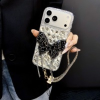 Coque de téléphone à nœud papillon et diamants en promotion pour iPhone 17 16 15 Pro Max, livraison gratuite avec chaîne, accessoires mobiles