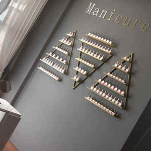 Présentoir mural de luxe doré pour vernis à ongles, avec cadre en fer moderne, personnalisé en usine, pour salon de beauté, certifié ISO9001, idéal pour supermarché - Product Image 1