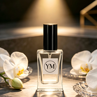 Flacon de parfum en verre rectangulaire transparent de haute qualité de 30 ml avec pulvérisateur à pompe personnalisable, rechargeable et vide pour usage cosmétique