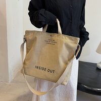 Sac à main élégant et moderne en toile pour femme, sac à bandoulière pour trajets quotidiens, grande capacité, sac d'école décontracté vintage avec bouton à lettres