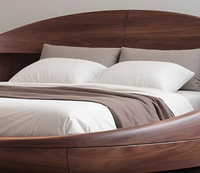 Lit double king-size en bois massif de style moderne du milieu du siècle, avec structure à tenons et mortaises, finition en noyer noir de forme ronde, design haut de gamme pour chambre principale