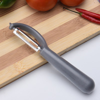 Huishoudelijke, specifieke voor de keuken, halvemaanvormige, plastic, handmatige fruit- en groenteschiller, multifunctioneel, onmisbaar schilgereedschap