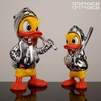 Statue de canard de dessin animé avec sculpture de batte de baseball canard en fibre de verre coloré pour la décoration de la maison artisanat en résine de galvanoplastie