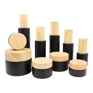 Pot vide en verre noir mat, flacon pulvérisateur, pot cosmétique pour crème et lotion, avec couvercle en plastique imitation bois, flacon de voyage rechargeable - Product Image 1