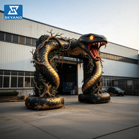 Arche gonflable série Serpent, modèle publicitaire gonflable en forme de python noir et or, design tridimensionnel