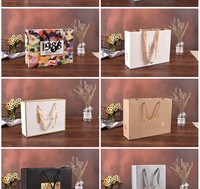 Sac fourre-tout cadeau biodégradable en papier d'art à motif marbre de luxe avec poignées en ruban, personnalisable pour bougies et artisanat